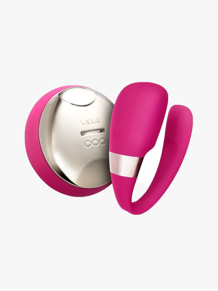 LELO Tiani 3 hot pink and gold U-shaped vibrator and remote on light gray background